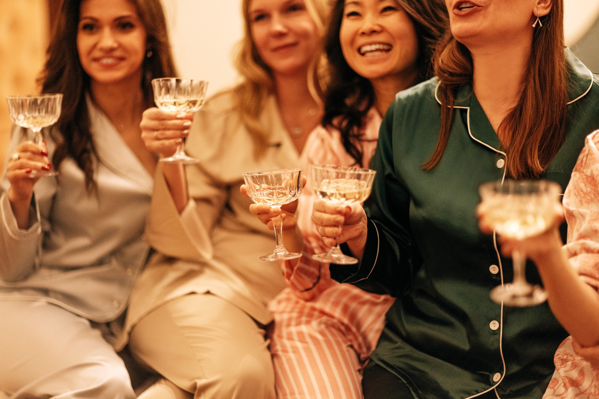 Friends in pajamas celebrating together
