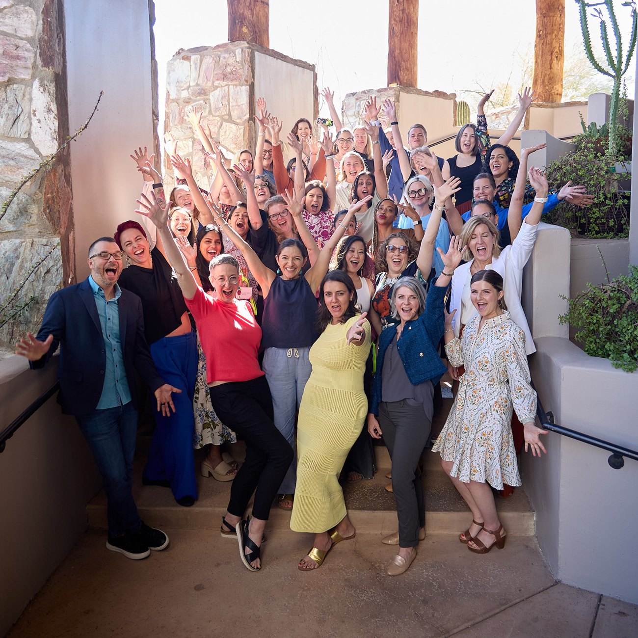 Group of attendees celebrating at the 2025 Physician Coaching Summit