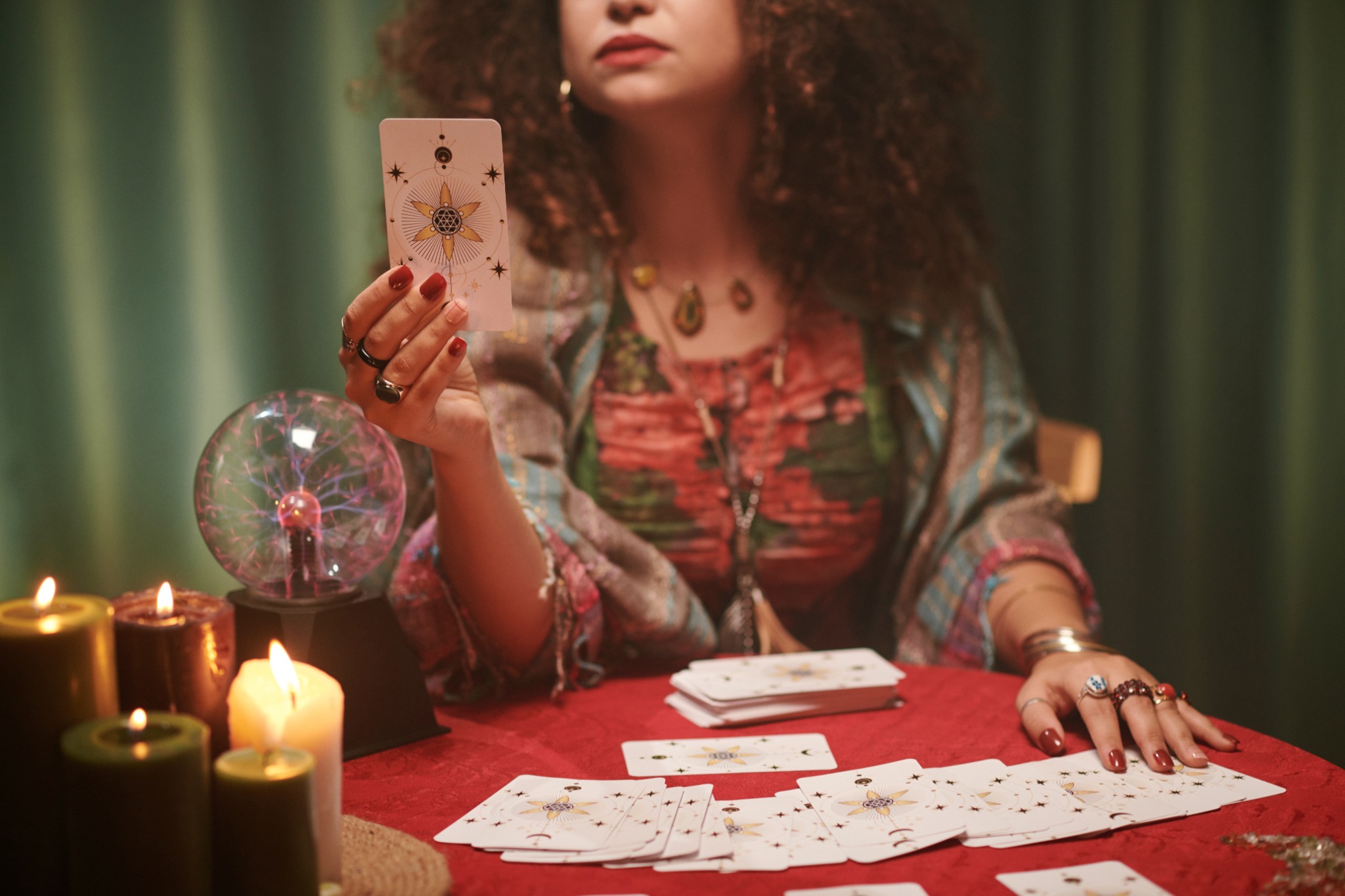 Tarot cards at a candlelit reading table